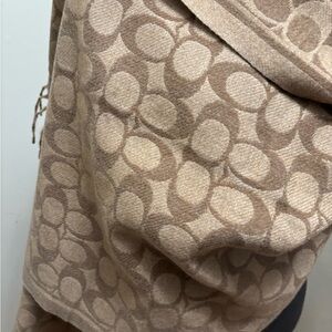 Coach mocha  Monogram Scarf measures 75x26 inches
